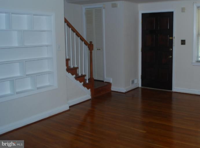 1126 Kevin Road Baltimore, MD 21229 - Photo 6 of 24 a view of entryway with wooden floor
