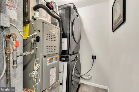 a view of a room with rack and white walls