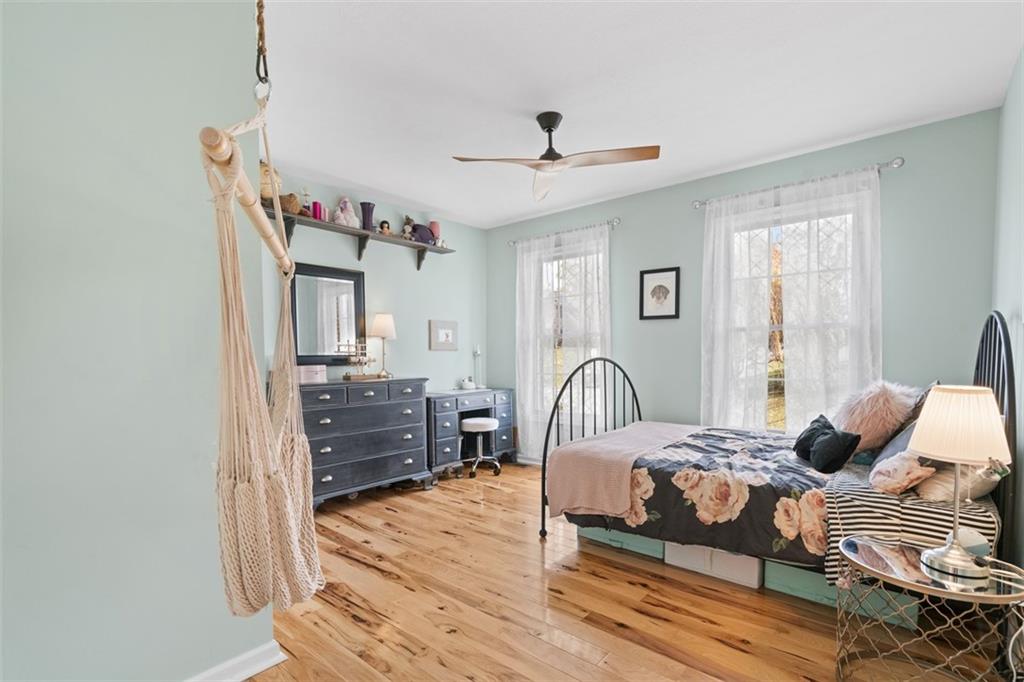 1478 Grandview Way Sewickley, PA 15143 - Photo 28 of 50 a bedroom with a bed and wooden floor