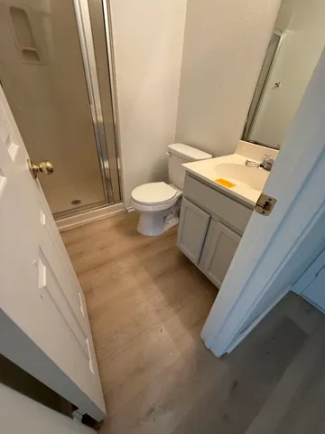 a bathroom with a sink and toilet