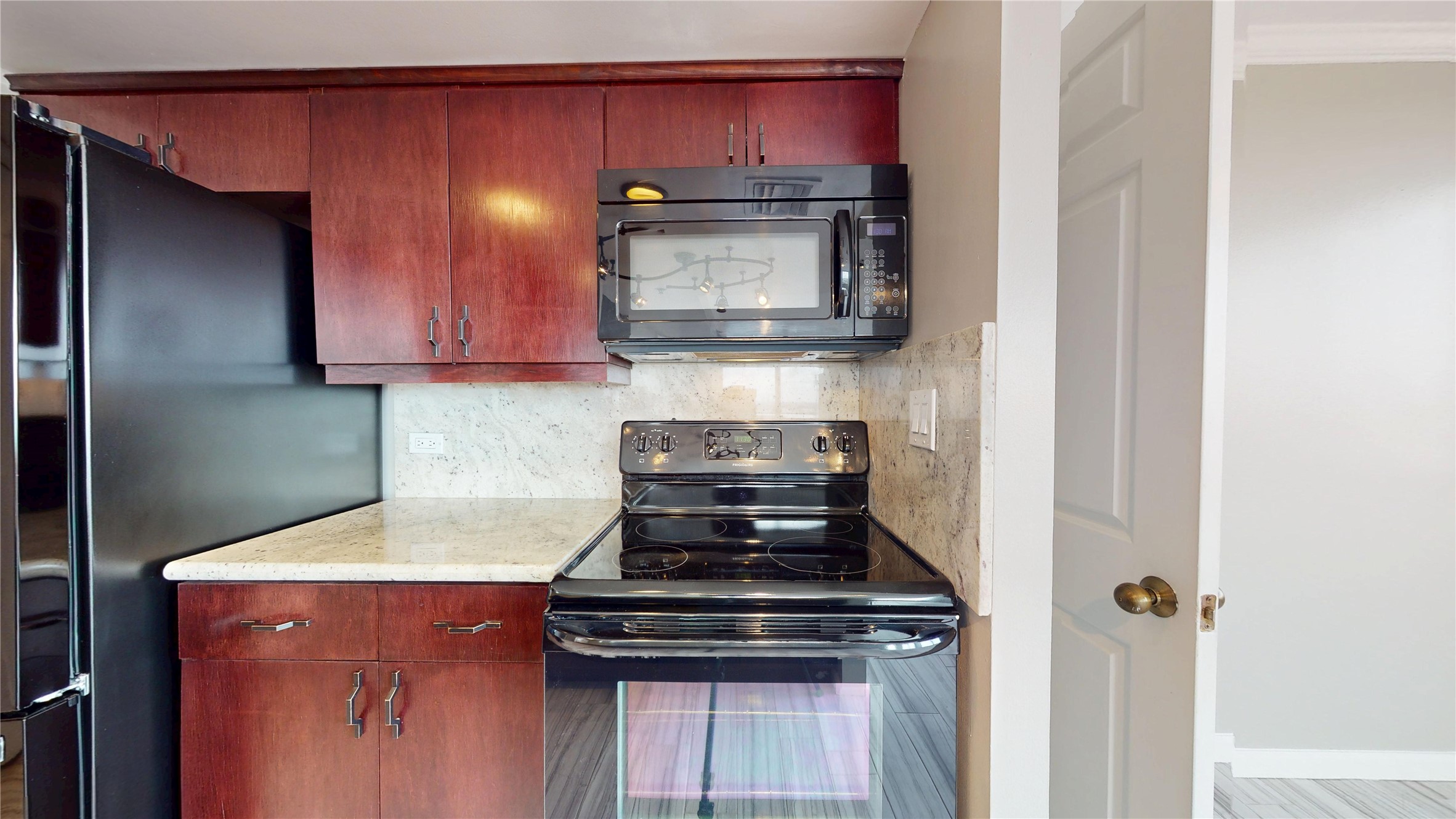 3525 Sage Road, Unit 1404 Houston, TX 77056 - Photo 20 of 36 a stove top oven sitting inside of a kitchen