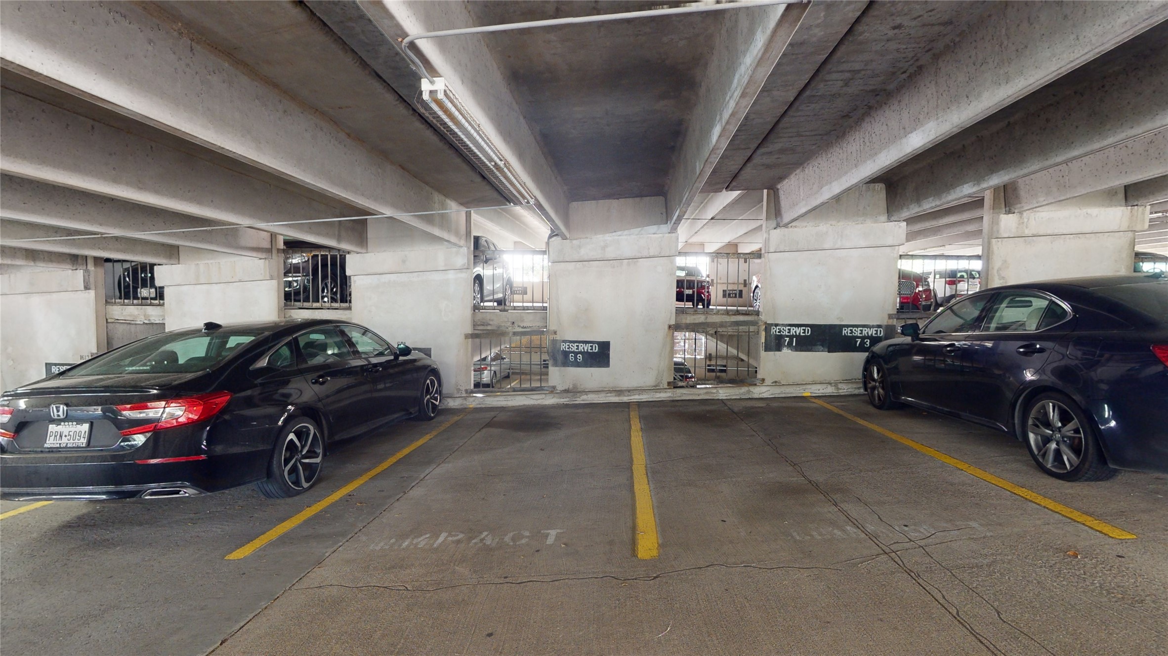 3525 Sage Road, Unit 1404 Houston, TX 77056 - Photo 26 of 36 a car that is parked in a parking space