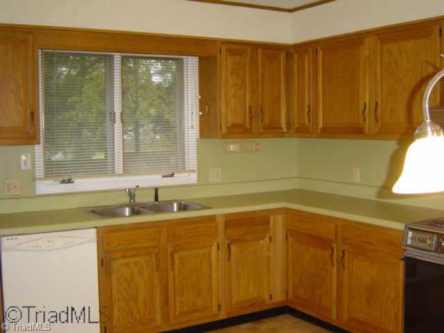 146 Old Mill Road, Unit C High Point, NC 27265 - Photo 5 of 9 Other. Kitchen with lot s of cabinets and large washroom with plenty of extra storage