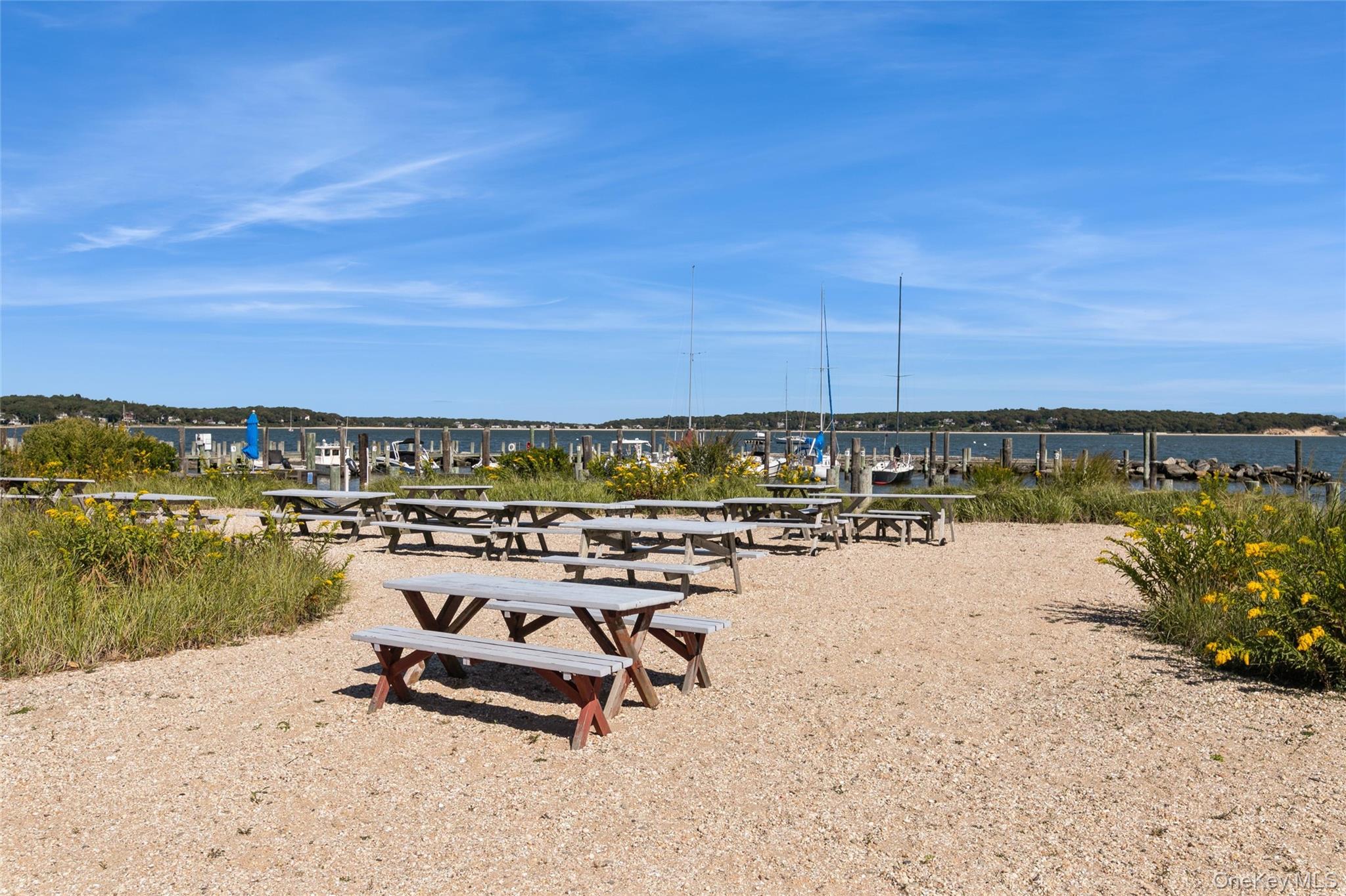 240 Wicks Road New Suffolk, NY 11956 - Photo 31 of 36 a view of a lake with outdoor space