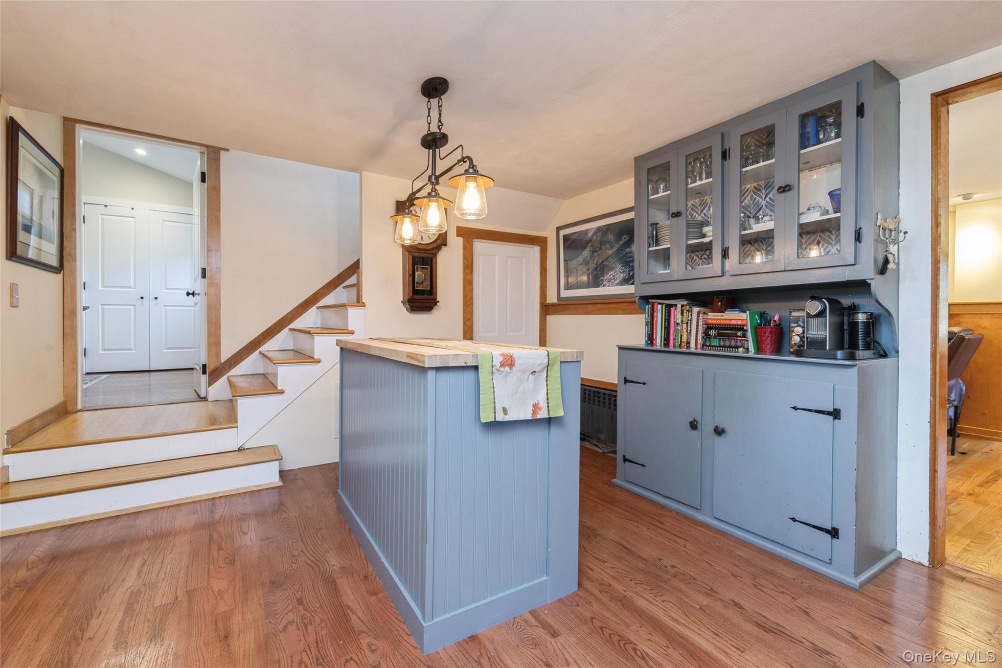240 Wicks Road New Suffolk, NY 11956 - Photo 9 of 36 a view of entryway and hall with wooden floor