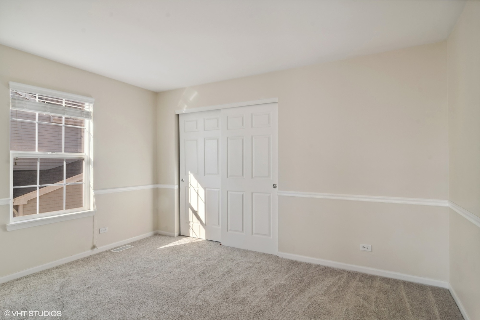 318 Emerald Drive Streamwood, IL 60107 - Photo 11 of 19 a view of an empty room with a window