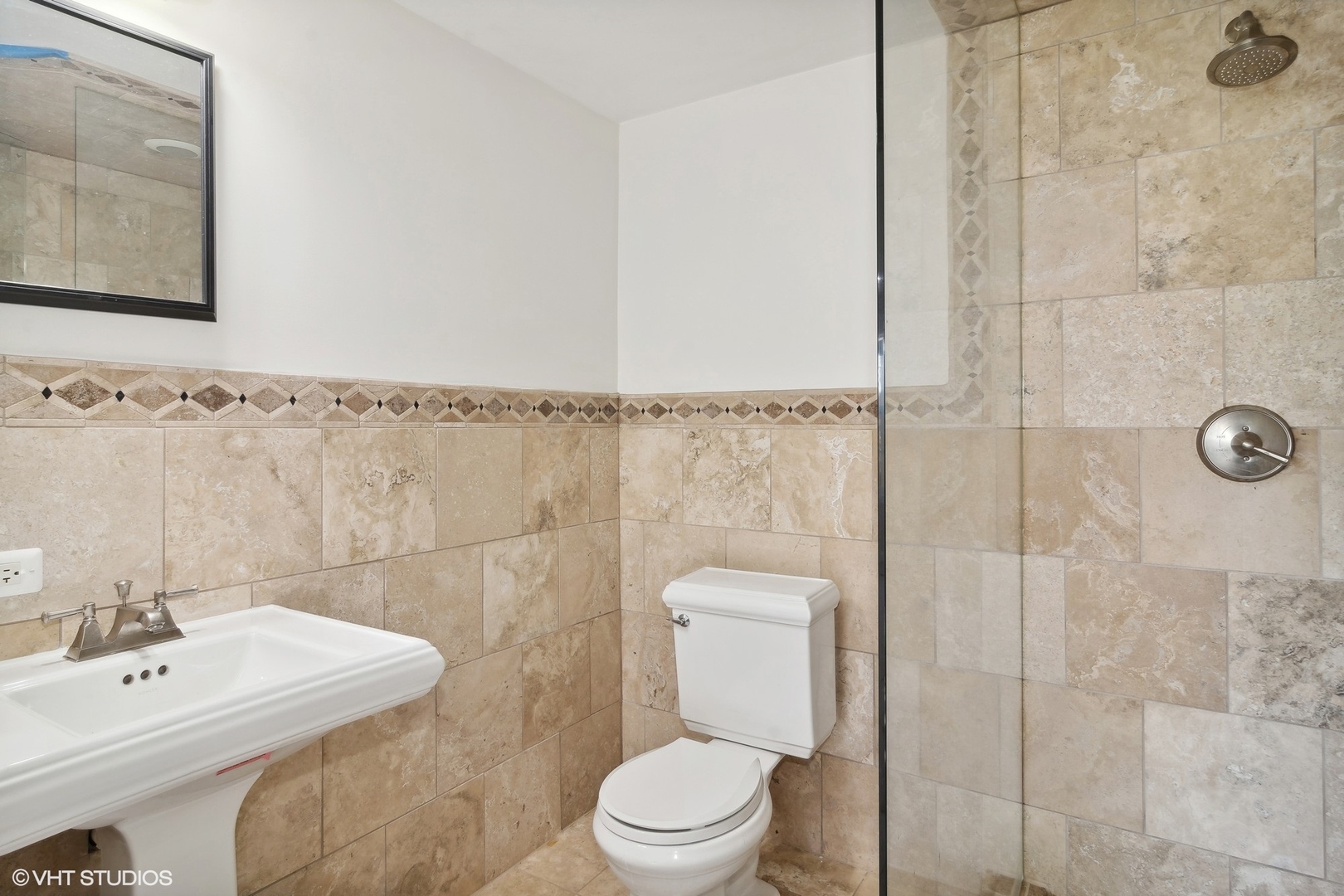 318 Emerald Drive Streamwood, IL 60107 - Photo 15 of 19 a bathroom with a toilet a sink a shower and mirror