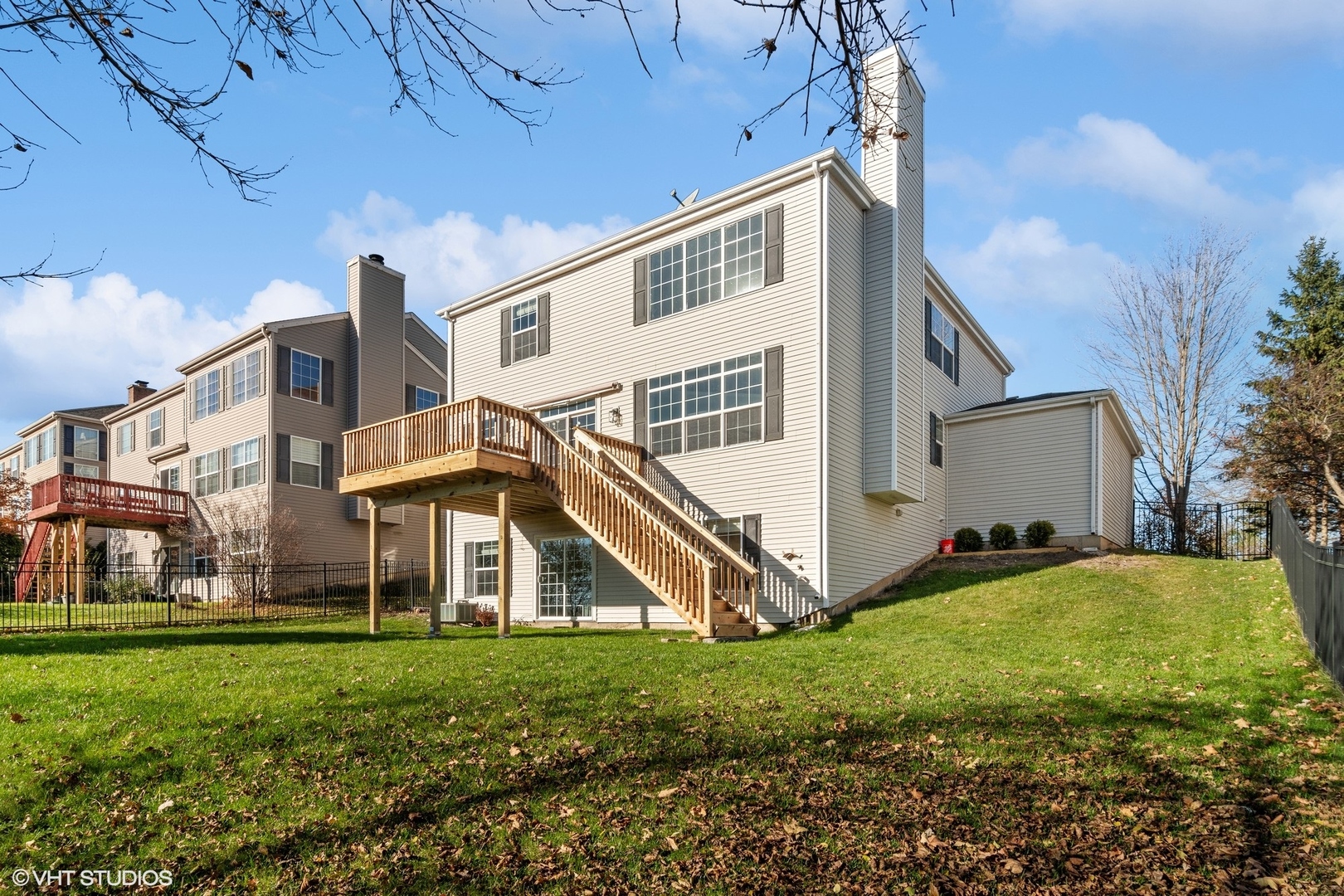 318 Emerald Drive Streamwood, IL 60107 - Photo 17 of 19 a view of a house with a yard