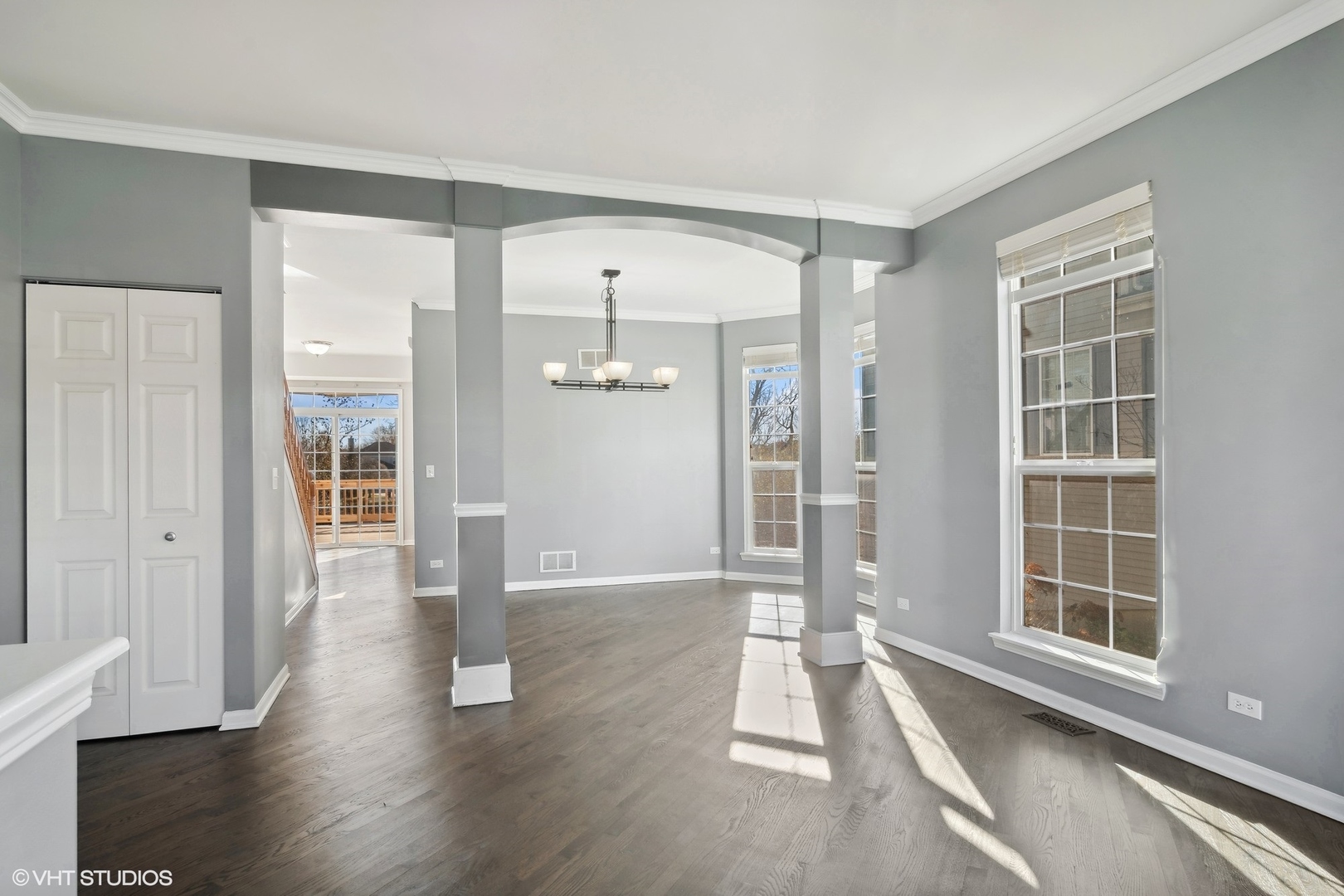 318 Emerald Drive Streamwood, IL 60107 - Photo 2 of 19 wooden floor in an empty room with a window