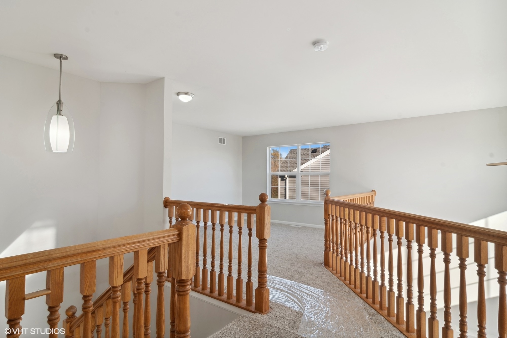 318 Emerald Drive Streamwood, IL 60107 - Photo 6 of 19 a view of a hallway with entryway and stairs