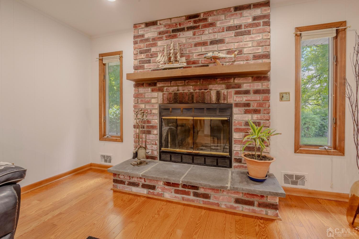 4 Putnam Road East Brunswick, NJ 08816 - Photo 24 of 53 a living room with fireplace furniture and a window