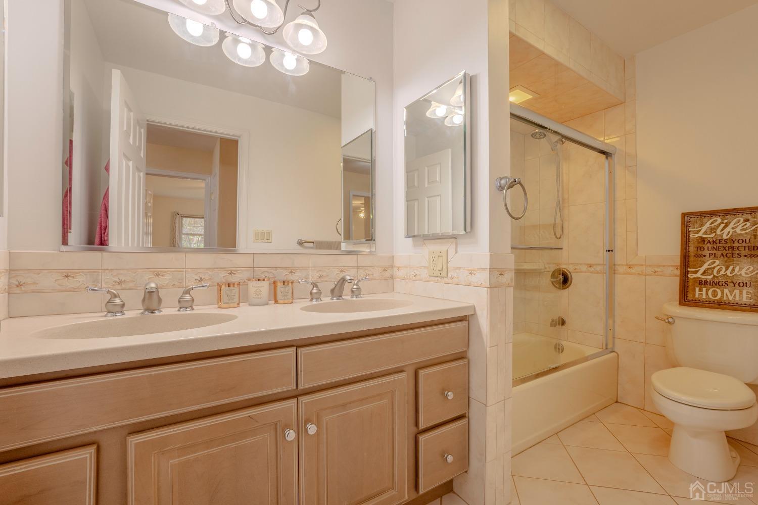 4 Putnam Road East Brunswick, NJ 08816 - Photo 26 of 53 a bathroom with a sink a toilet and shower
