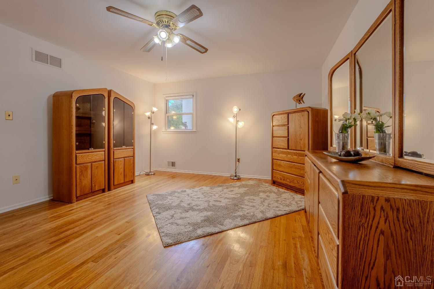 4 Putnam Road East Brunswick, NJ 08816 - Photo 33 of 53 a kitchen with kitchen island granite countertop a stove and a refrigerator