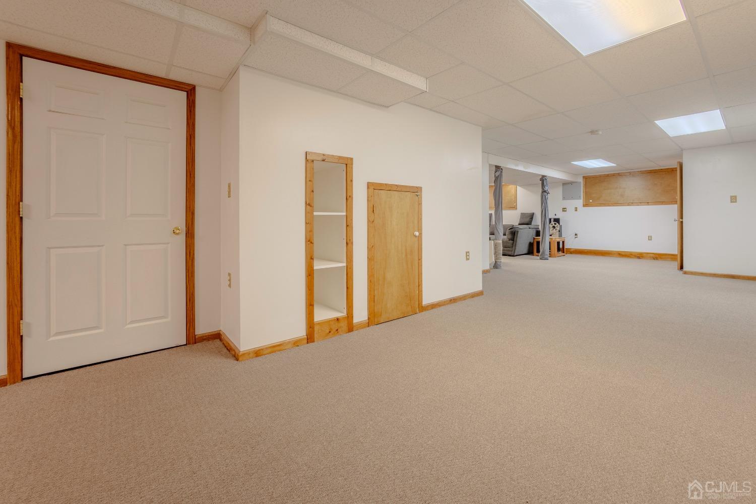 4 Putnam Road East Brunswick, NJ 08816 - Photo 38 of 53 a view of a livingroom with a car parked in garage