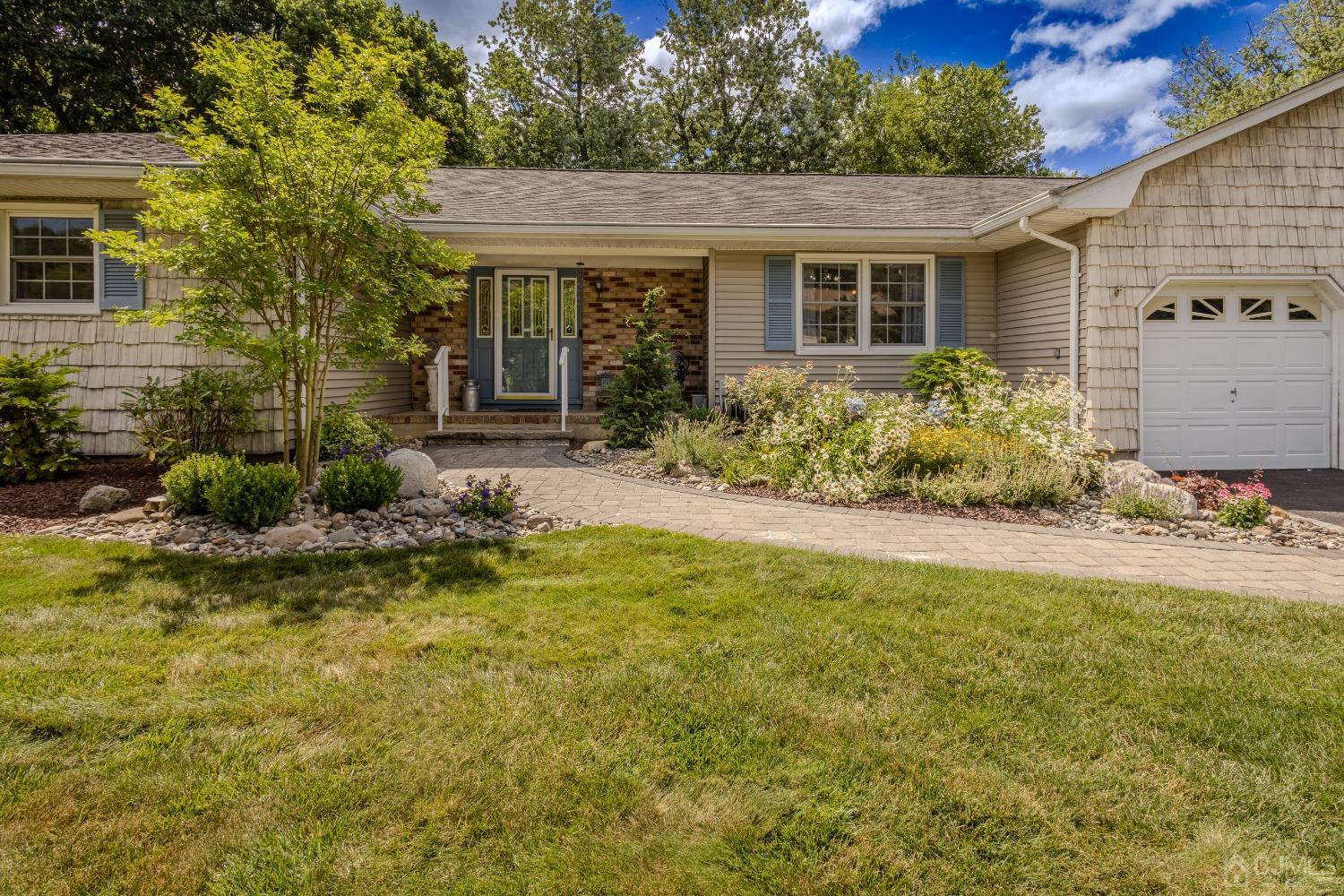 4 Putnam Road East Brunswick, NJ 08816 - Photo 4 of 53 a view of a house with a yard and plants