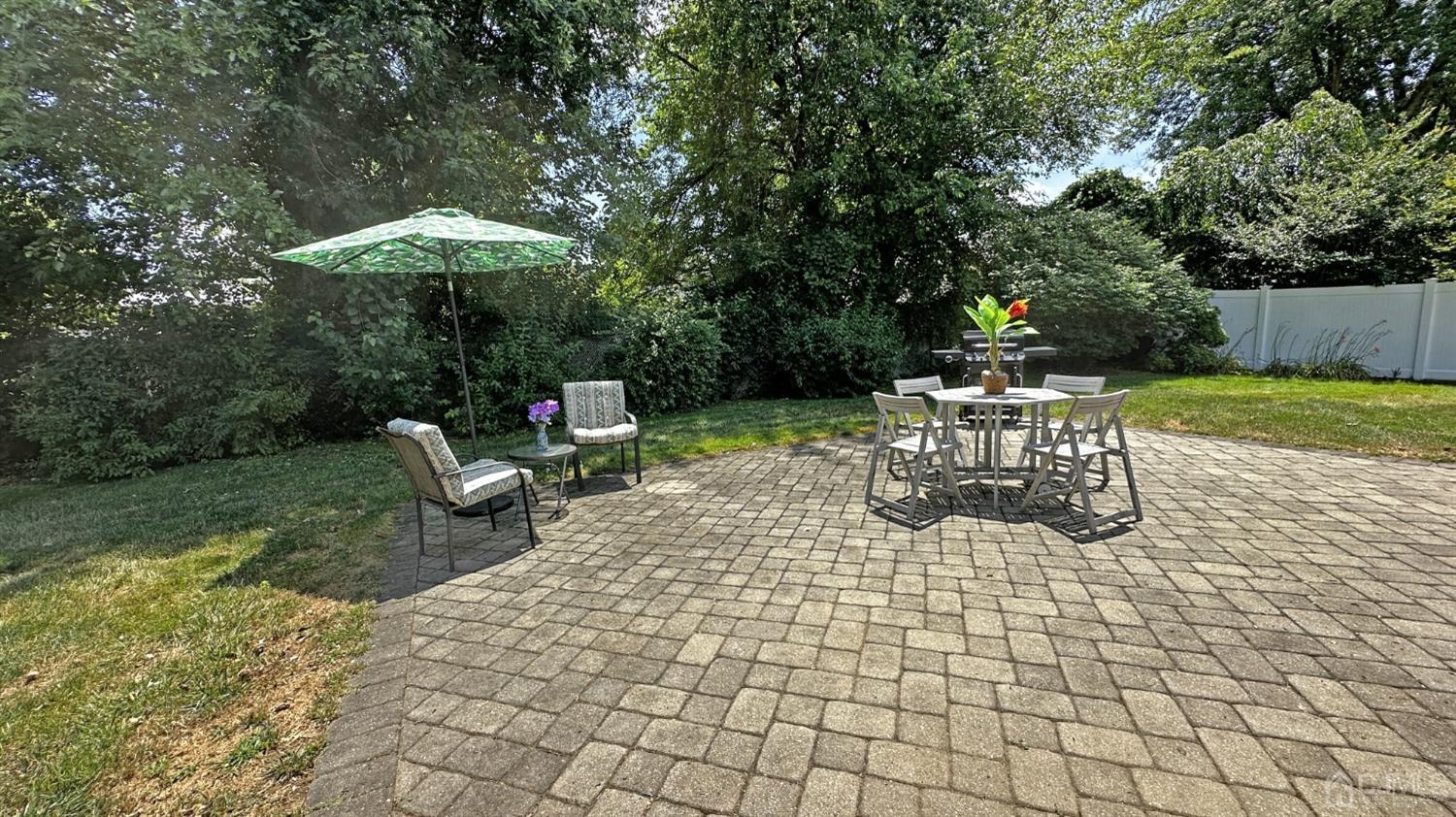 4 Putnam Road East Brunswick, NJ 08816 - Photo 43 of 53 a view of a chairs and table in backyard
