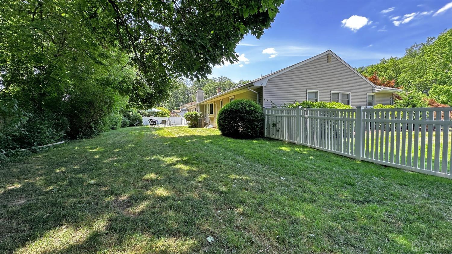 4 Putnam Road East Brunswick, NJ 08816 - Photo 51 of 53 a view of a house with a yard and plants