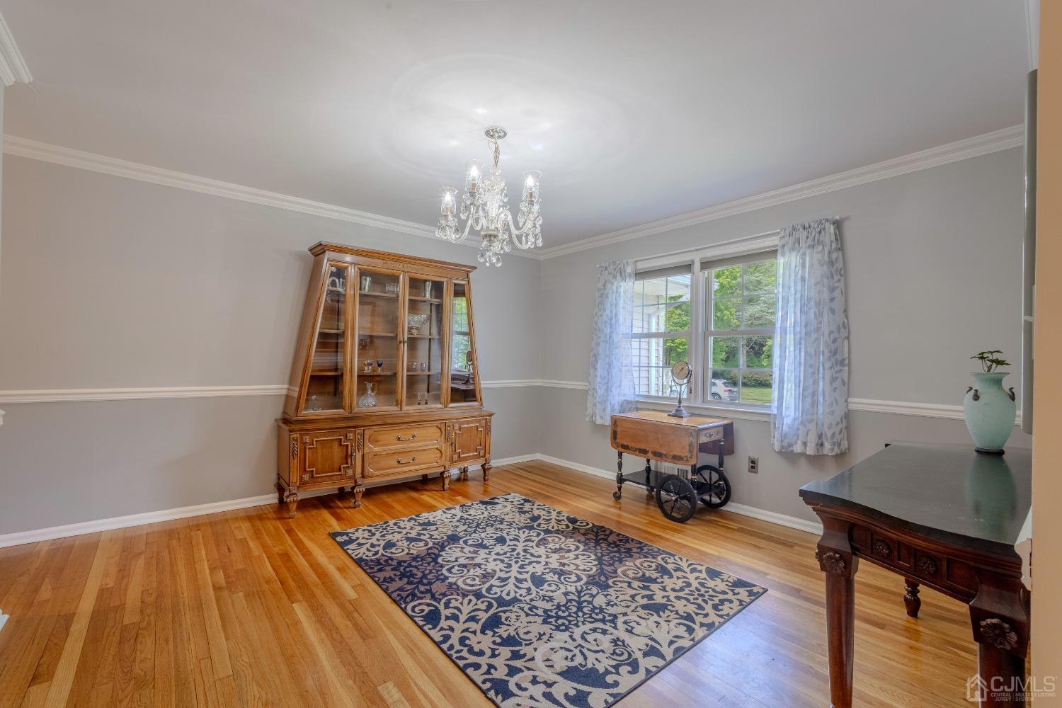 4 Putnam Road East Brunswick, NJ 08816 - Photo 10 of 53 a living room with furniture and a rug