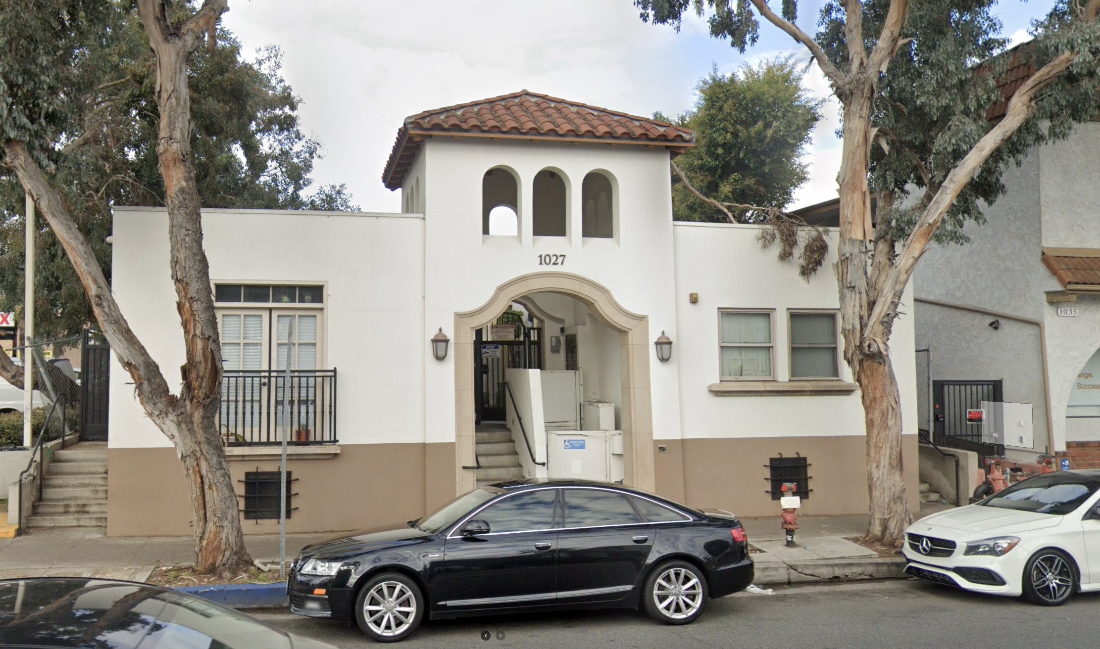 a car parked in front of a house