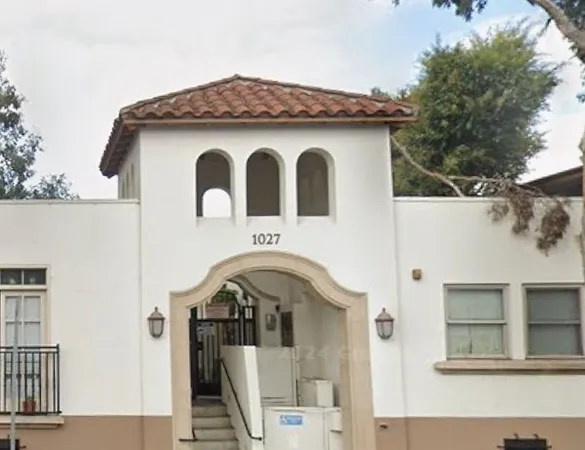 a front view of a house with a porch