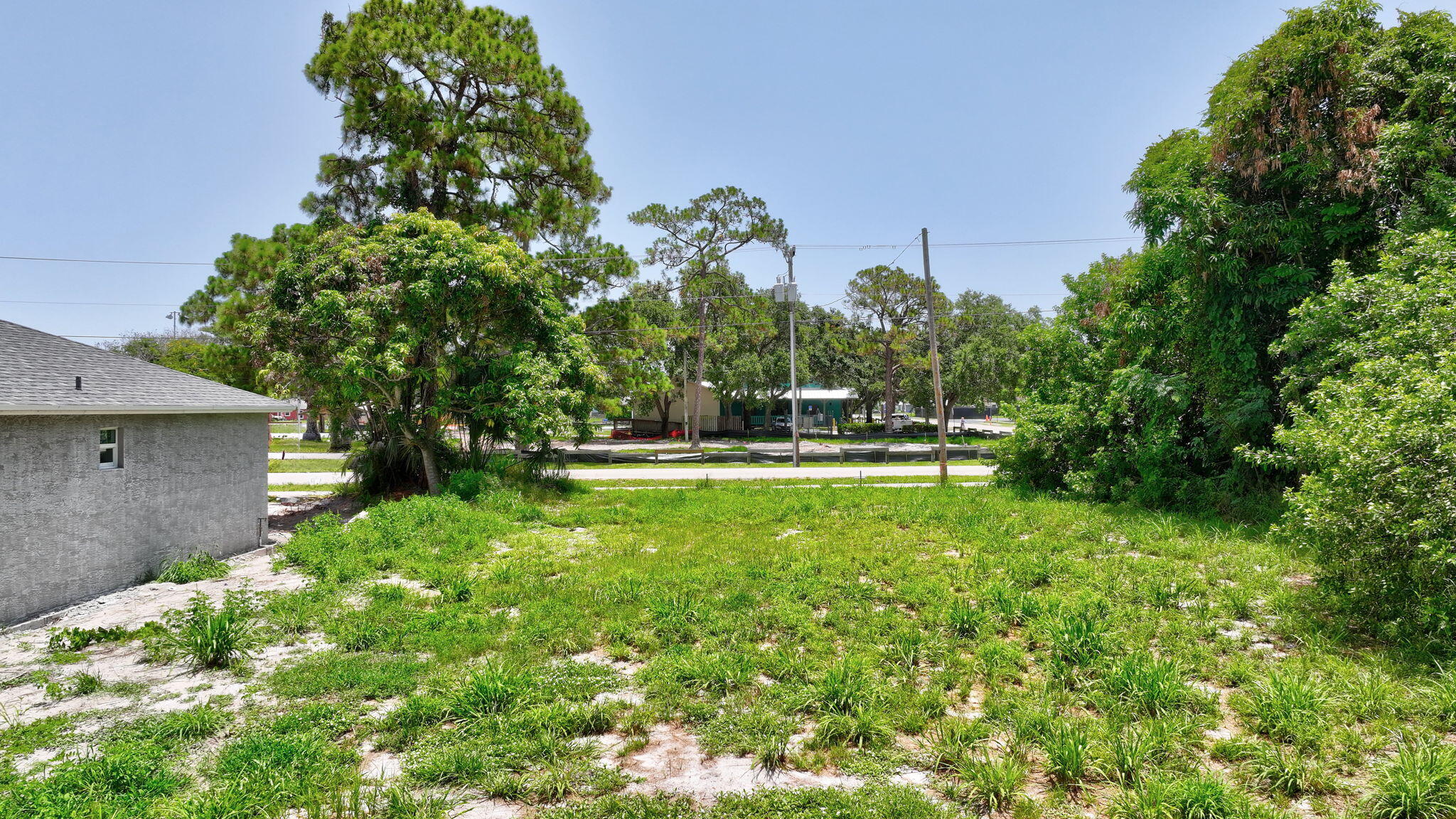 5684 Southeast 45th Avenue Stuart, FL 34997 - Photo 6 of 27 6-web-or-mls-DJI_20260620045829_0016_D_1