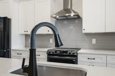 a view of storage and utility room with washer and dryer