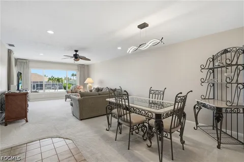 a bedroom with a bed and a table