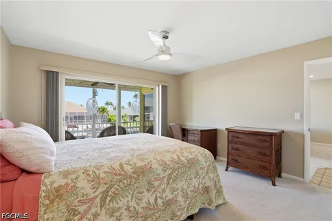 a bedroom with a bed and with furniture
