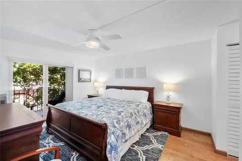 a bed room with a bed and a window