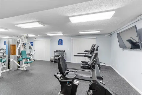 a view of a room with gym equipment