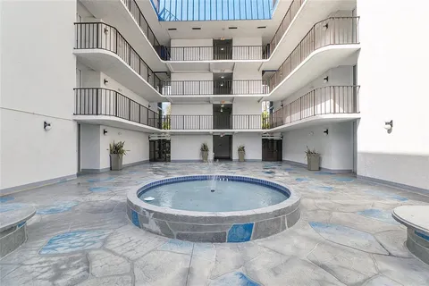 a view of entryway and kitchen