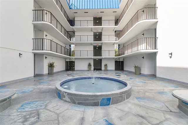 a view of entryway and kitchen