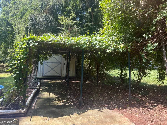 a backyard of a house with lots of green space
