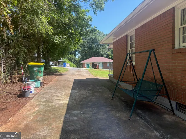 a view of a backyard with a slide