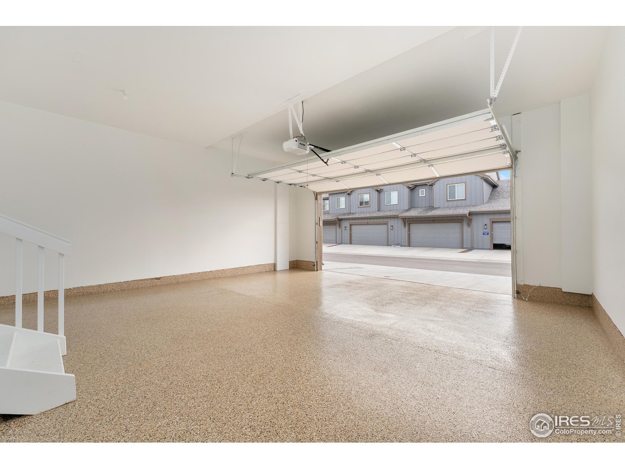 6228 Vernazza Way, Unit 3 Windsor, CO 80550 - Photo 31 of 41 Oversized 2 car garage with lofted ceilings