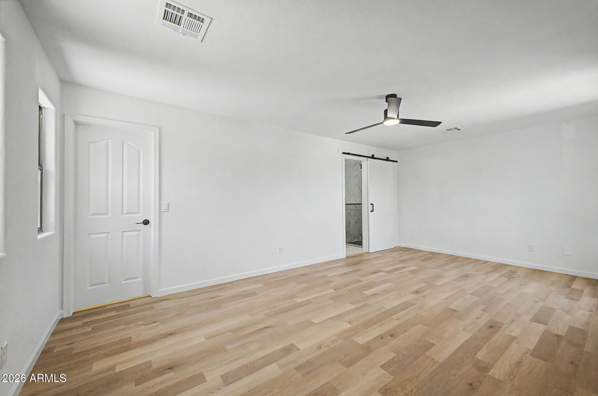 6452 West Ruth Avenue Glendale, AZ 85302 - Photo 20 of 35 a view of empty room with wooden floor