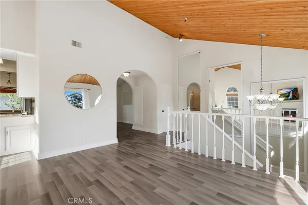 a view of entryway with wooden floor