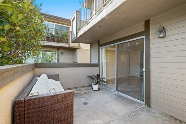 a view of balcony with furniture
