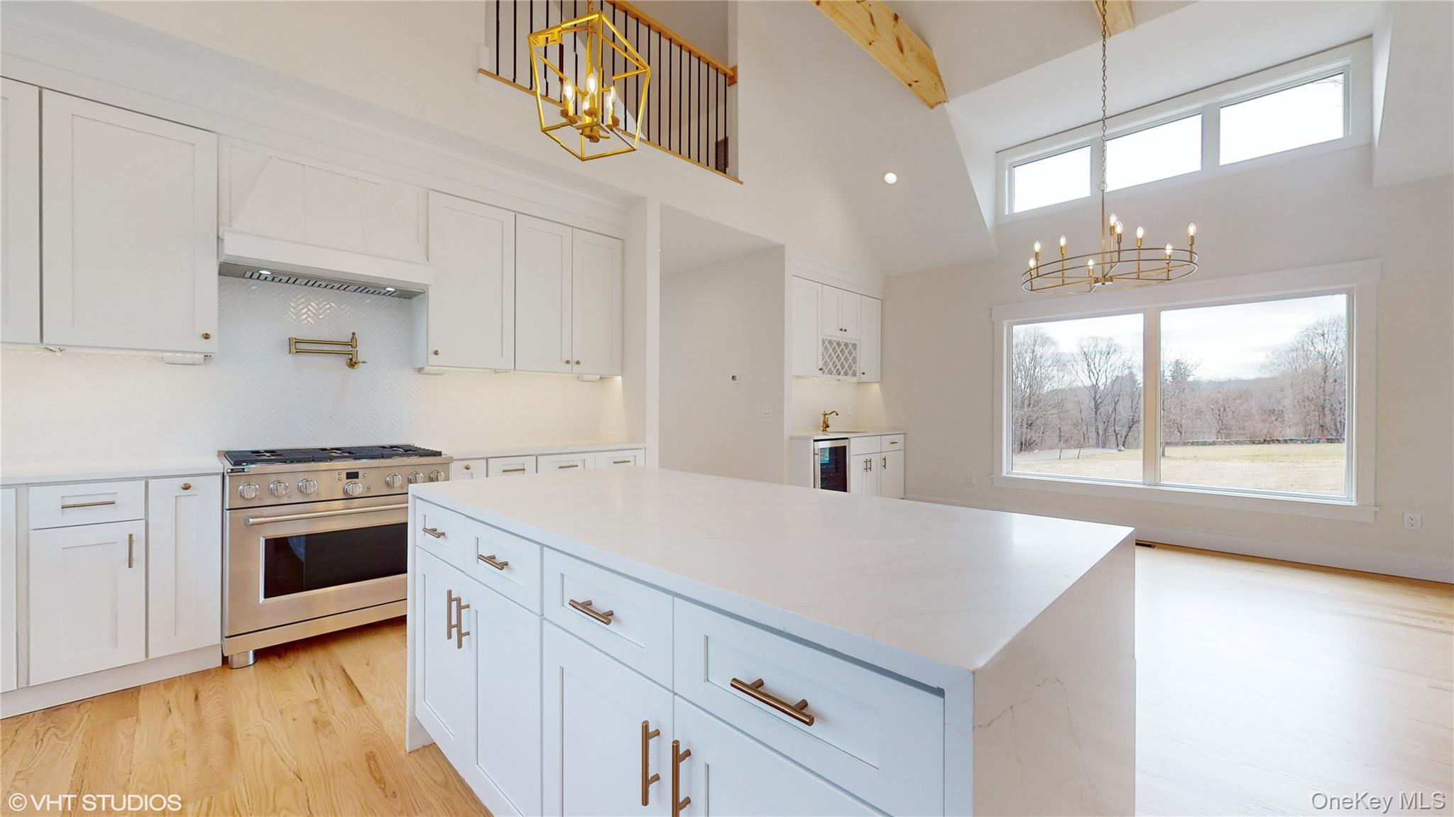 120 Harmony Road Pawling, NY 12564 - Photo 5 of 15 a kitchen with a stove a sink and a window