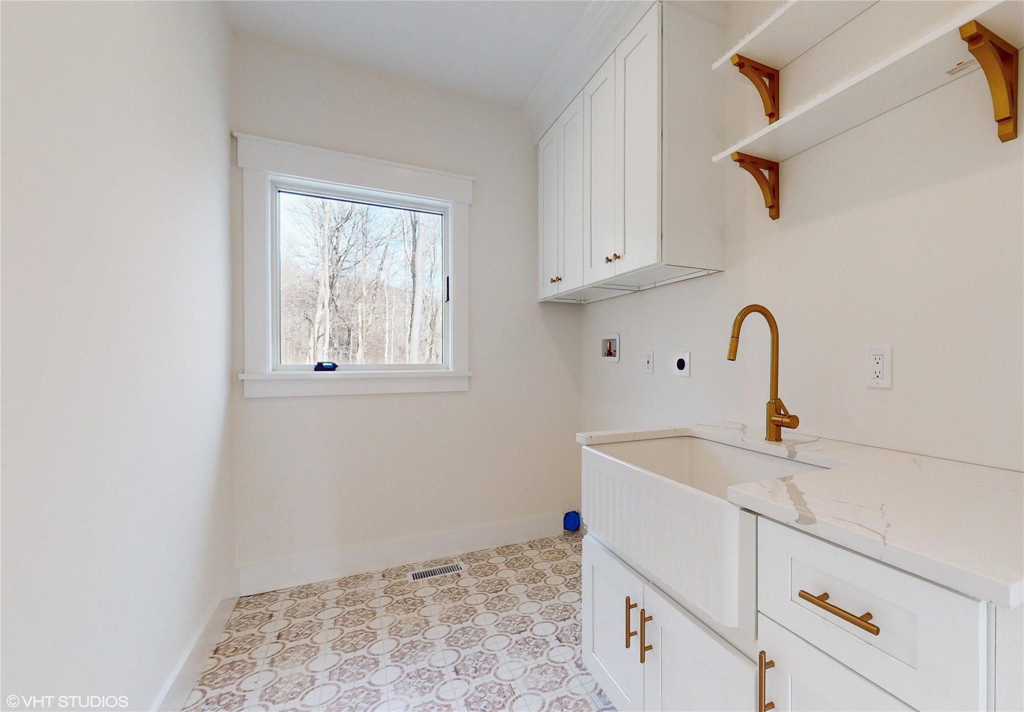 120 Harmony Road Pawling, NY 12564 - Photo 6 of 15 Laundry area with hookup for washer/dryer, cabinets, and sink