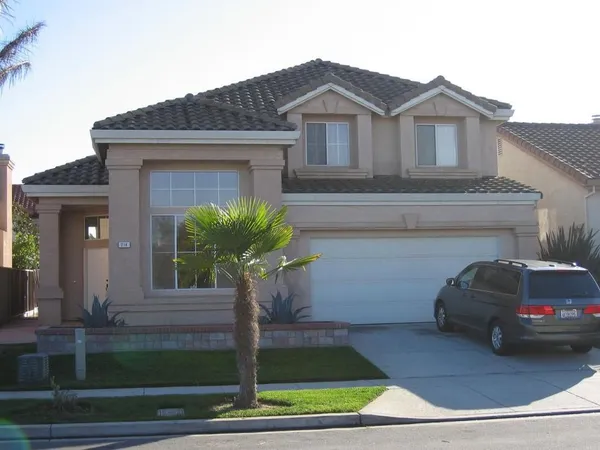 a house view with a garden space