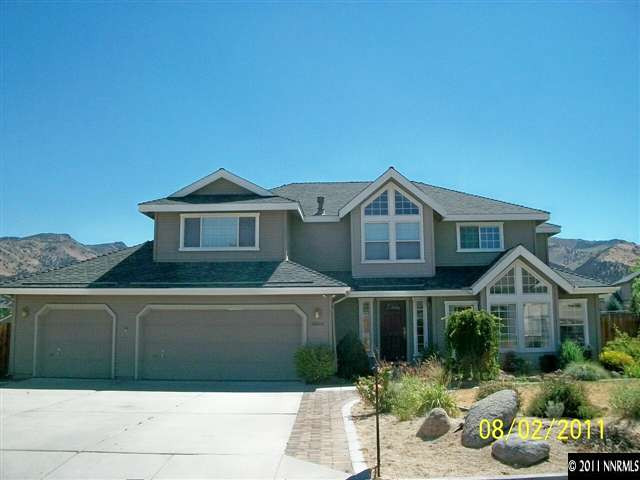 16010 Scarlet Way Reno, NV 89521 - Photo 1 of 13 a front view of a house with porch