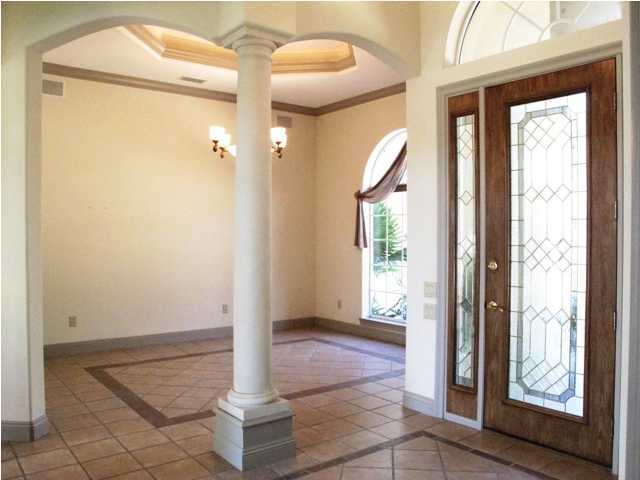 4491 Woodbridge Road Niceville, FL 32578 - Photo 6 of 17 a view of a room that has a large window and front door