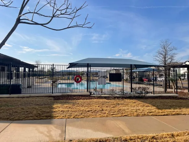 a outdoor view of a house with garage