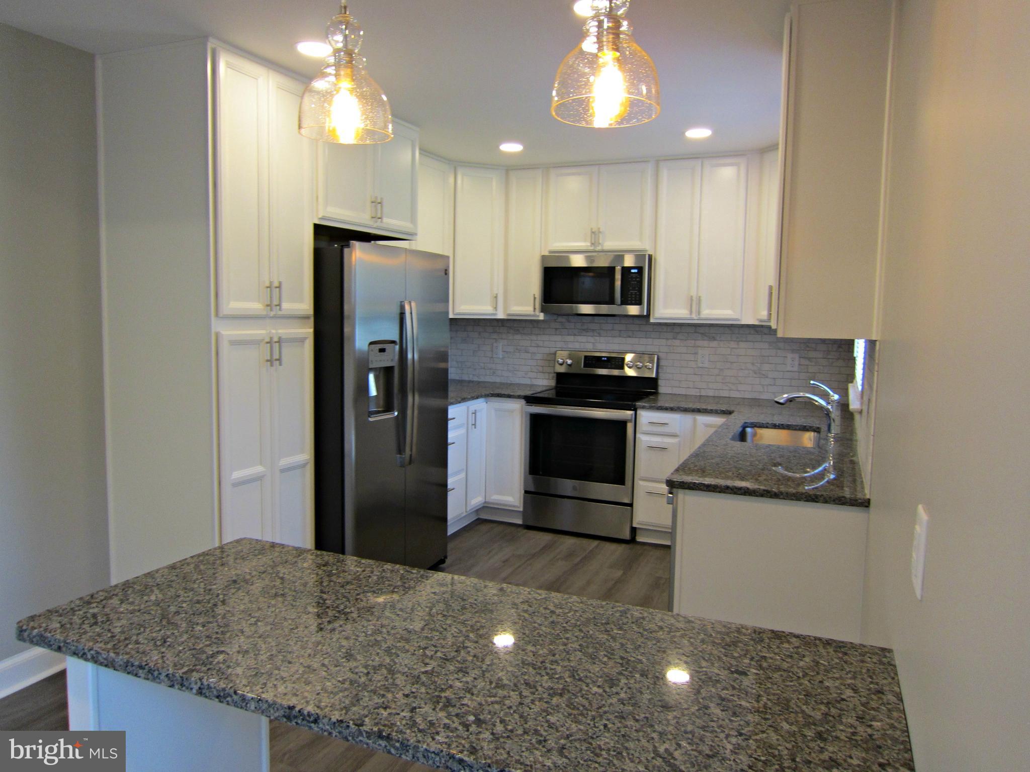 16808 Hampton Road Williamsport, MD 21795 - Photo 3 of 18 Kitchen with granite and stainless steel appliance