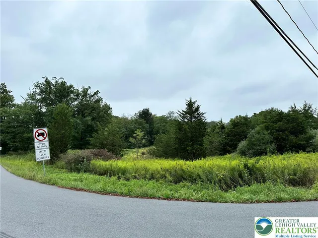 a view of a street sign under an umbrella