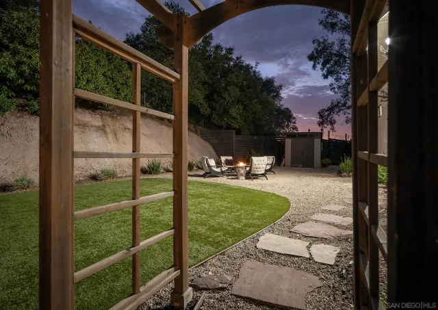 a view of a porch with a yard