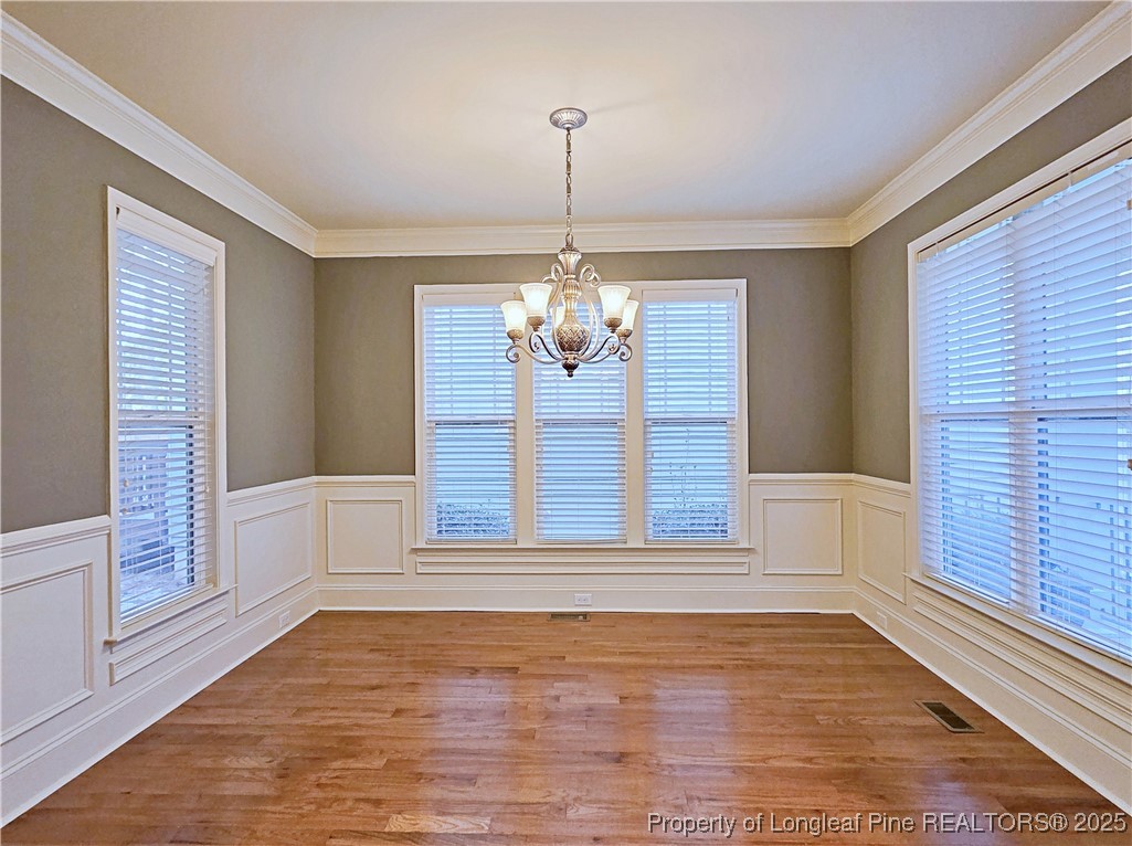 175 Pine Hawk Drive Spring Lake, NC 28390 - Photo 13 of 41 a view of wooden floor and windows in a room