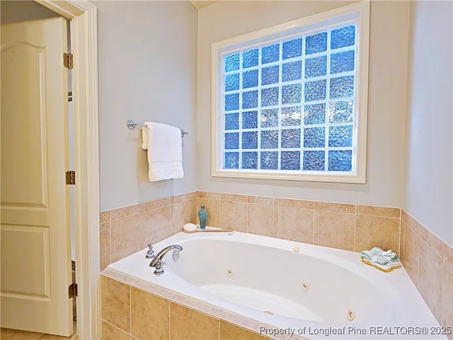 a bathroom with a bathtub