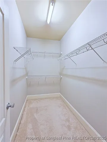 a view of a room with racks on the wall